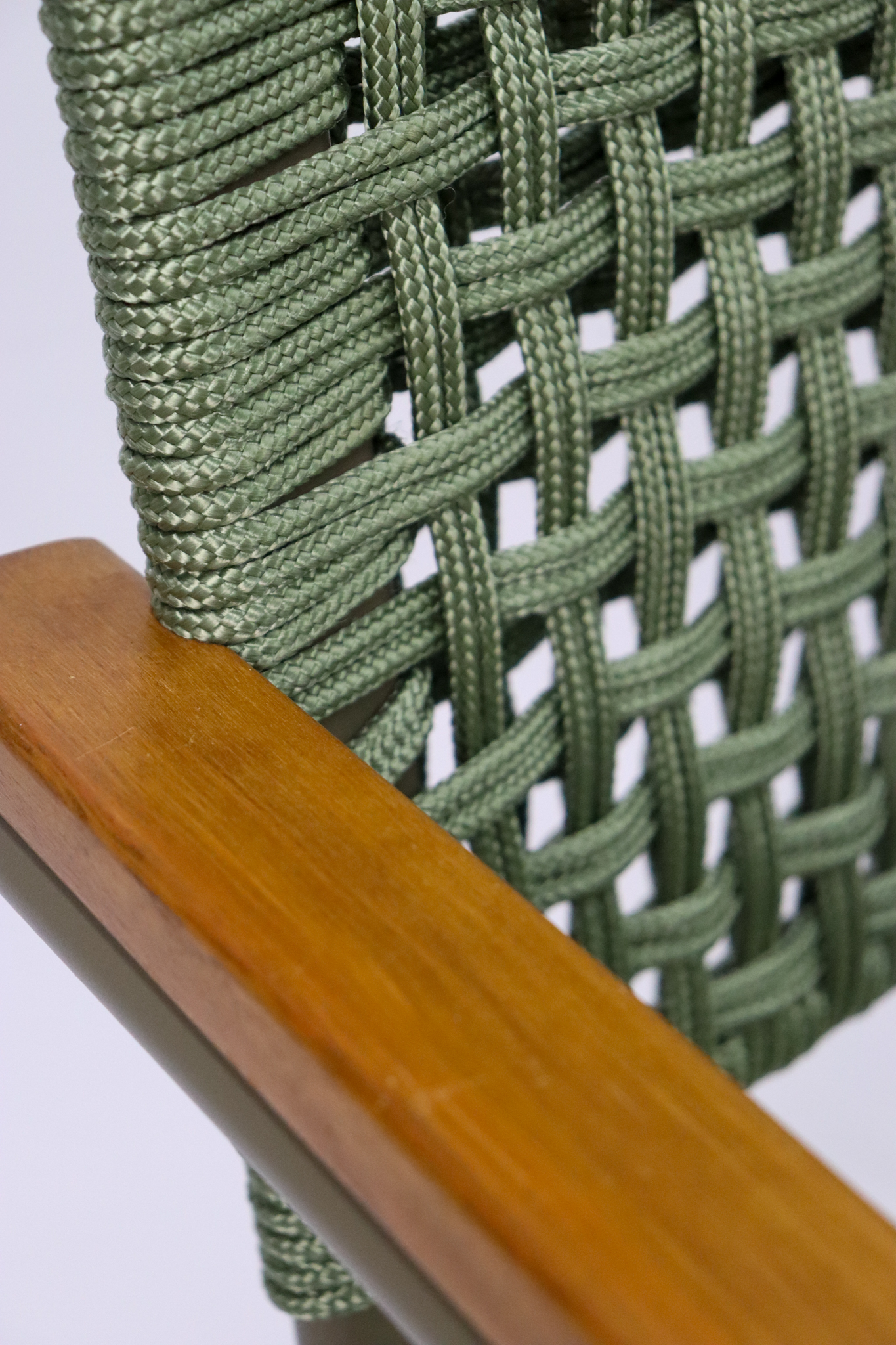 Cadeira de corda náutica verde.